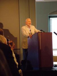 Buzz Aldrin at the podium.